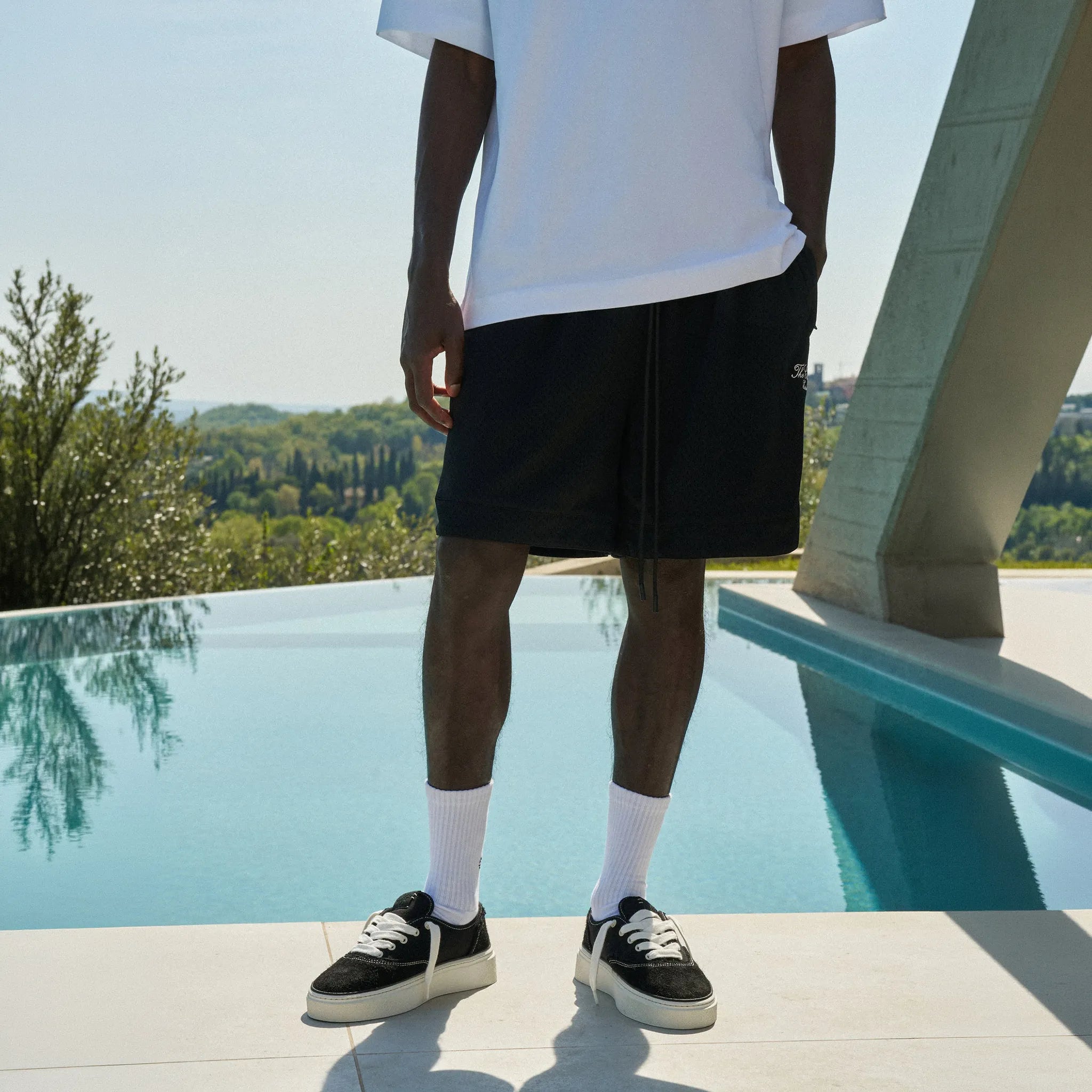 Model View of The Couture Club Airtex Black Shorts